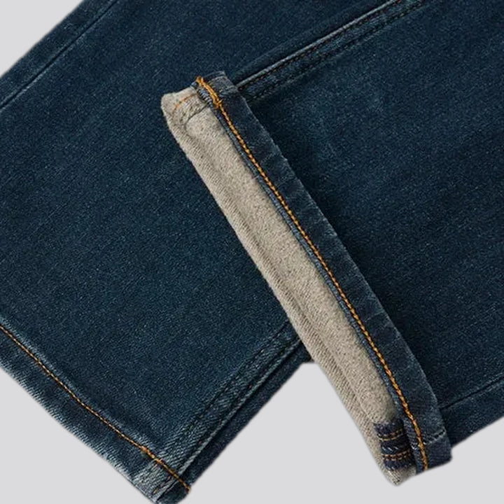 Mid-waist dark sanded men's jeans